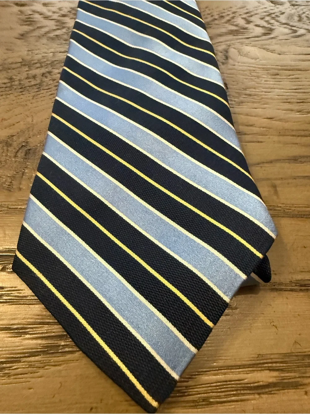Tommy Hilfiger Navy and Light Blue Striped Silk Tie with Yellow Accents